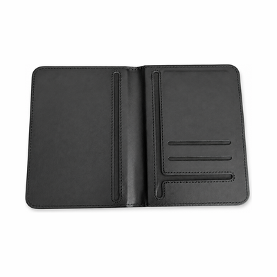 KindReturn Trackable Passport Cover, black leather, open flat interior view